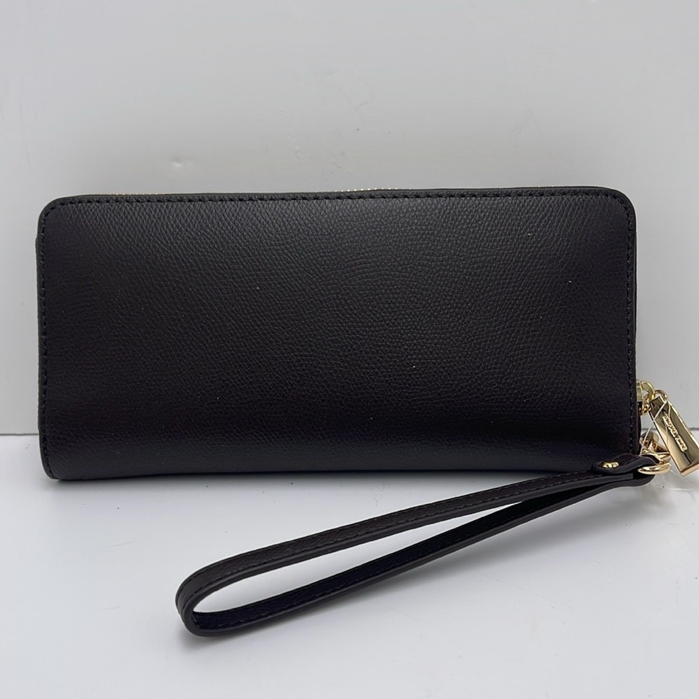 Michael Kors JST Lg Leather Continental Wallet Wristlet Phone Holder
Chocolate - Picture 7 of 16